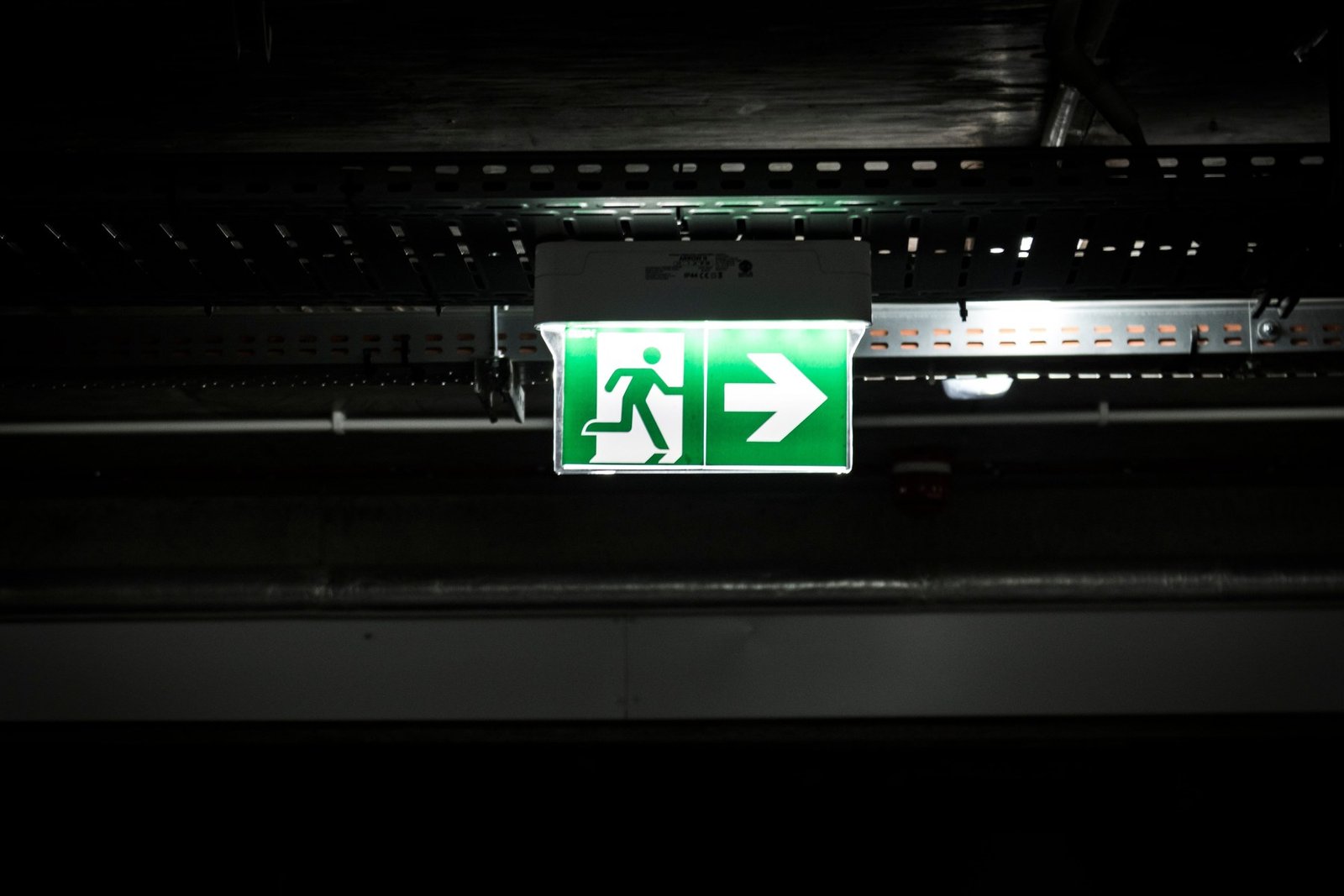 A hospital corridor lit at night