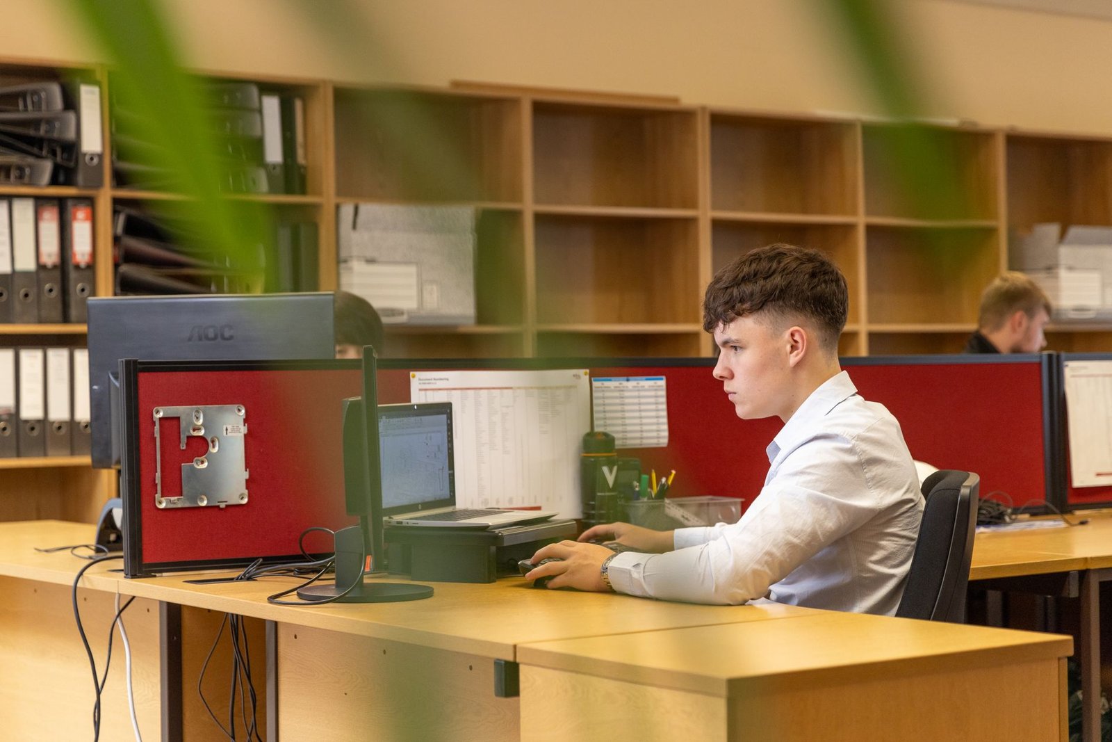 An office workstation of the kind common in the Riverport and Westport corridors